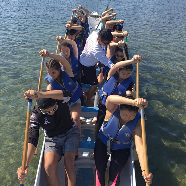 Students in a dragon boat