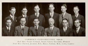 Black and white photo of a group of men in suits.